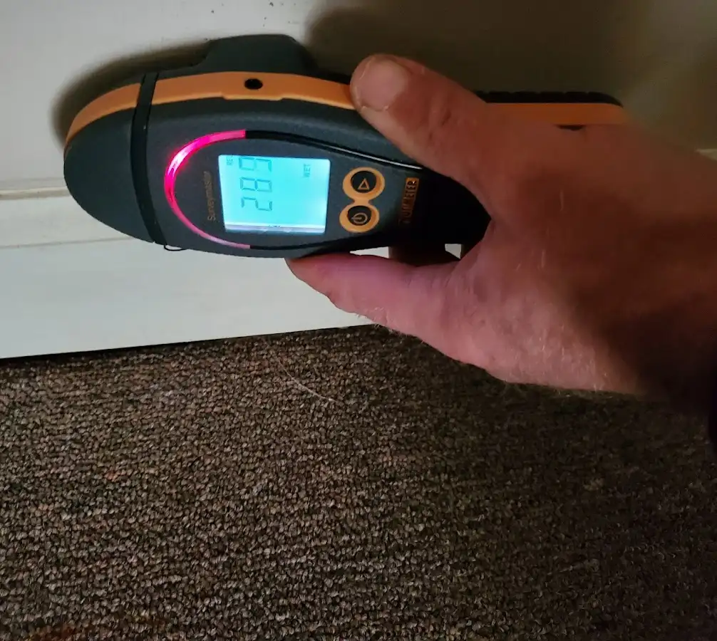 Moisture detection at baseboard during Burst Pipe Cleanup in Scituate
